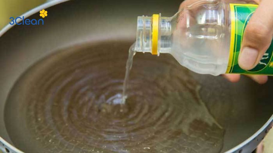 Cách làm sạch xoong nồi bị cháy bằng giấm