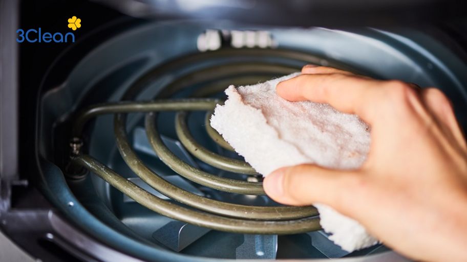 Làm sạch baking soda còn sót lại trong nồi chiên không dầu bằng giấm 